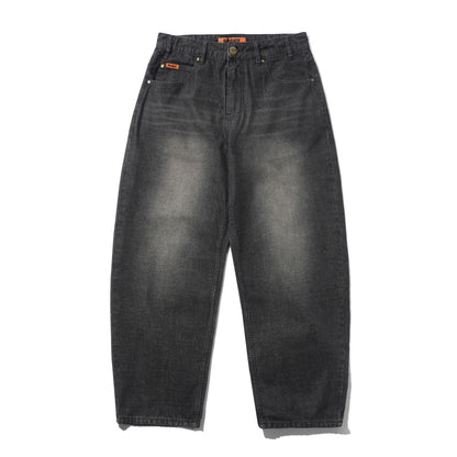 A pair of wide-leg, cropped dark gray washed denim jeans with orange brand labels on the waistband and pocket, displayed flat against a white background.
