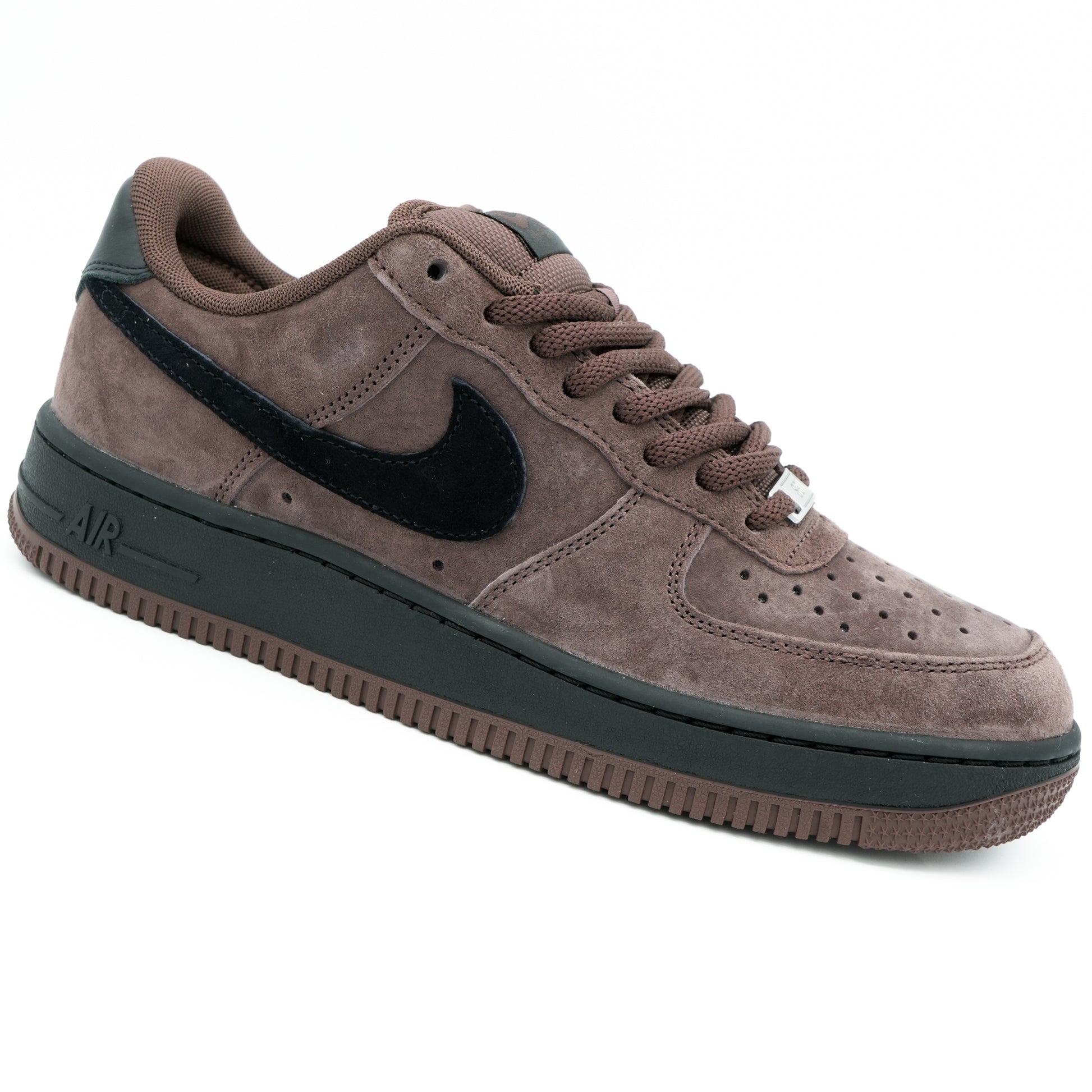A Nike Air Force 1 sneaker in a brown suede and dark green leather combination, featuring a black Swoosh logo and a black midsole, shown on a white background.