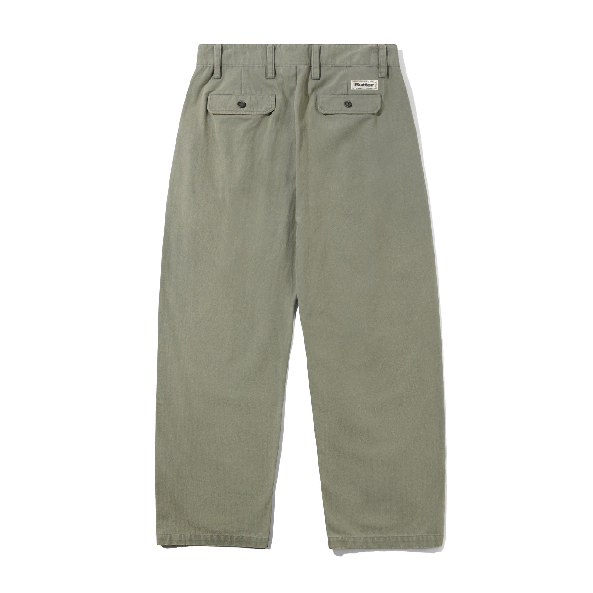 Green pants with a brand logo on a white background