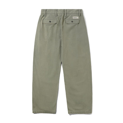 Green pants with a brand logo on a white background