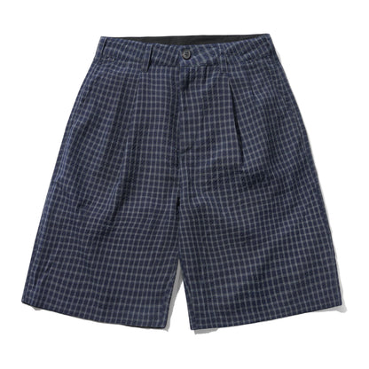 A pair of men's shorts featuring a navy blue and white checkered pattern, displayed flat against a white background.