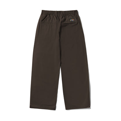 A pair of dark brown wide-leg work pants with an elastic waistband, shown from the back on a white background.