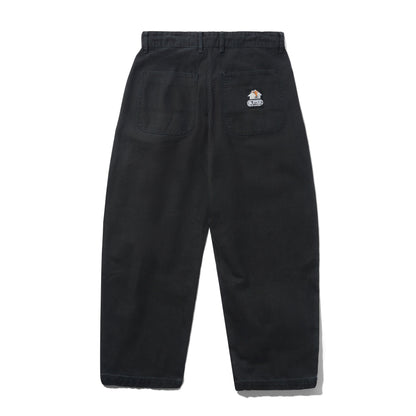 Black wide-leg work pants shown from the back, featuring a button waist, belt loops, two large back pockets, and a small sewn on Butter Goods logo on the upper right pocket.
