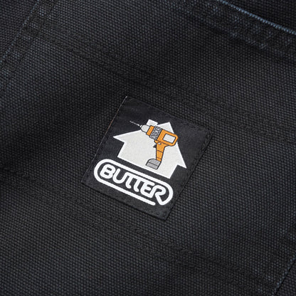 Butter Goods logo patch on black pants